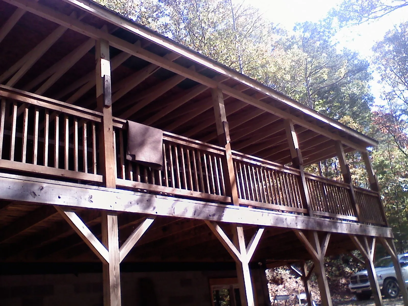Timber framing under a new elevated porch and deck — Roof Leak Repair in Urbanna by Roofing Brothers